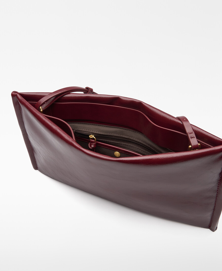 pochette rembourrée en cuir ou non-cuir pour femme