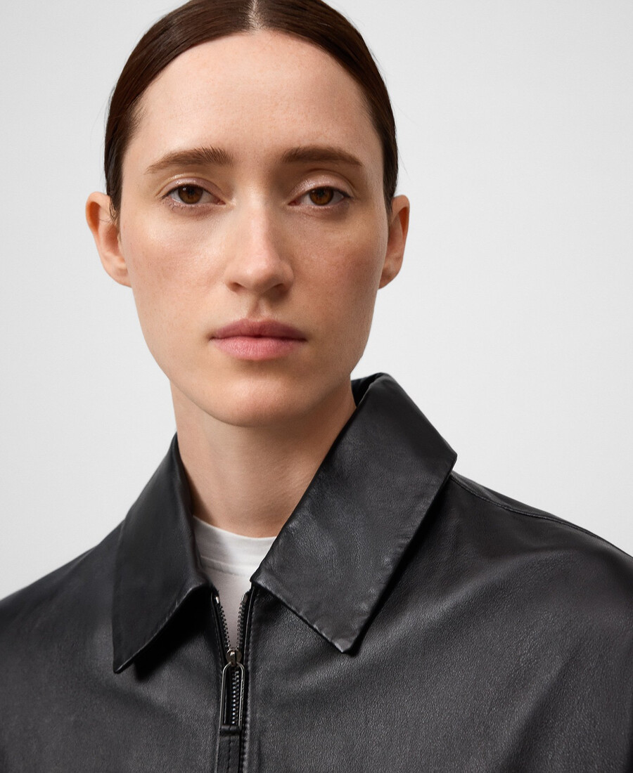 veste en cuir avec cape arrière pour femme