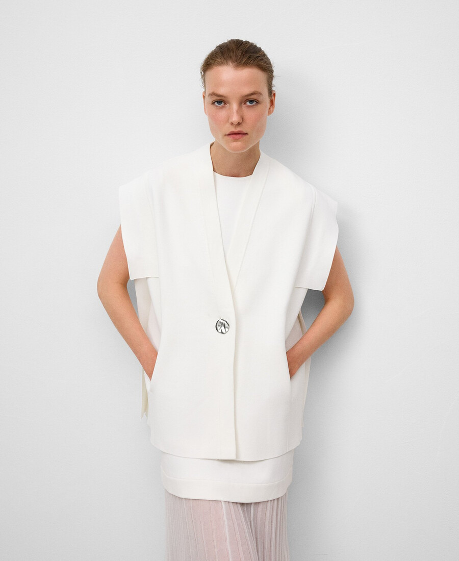 gilet en maille avec empiècements latéraux femme