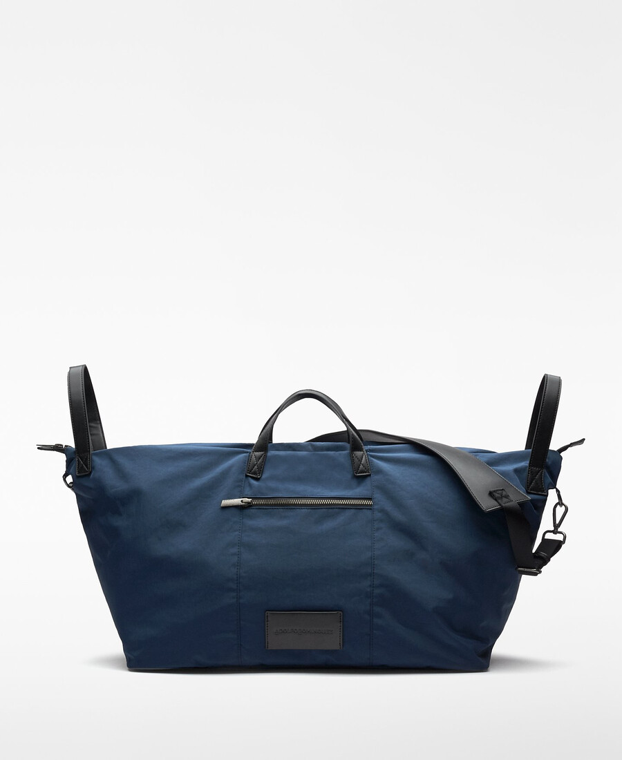 homme de sac de voyage