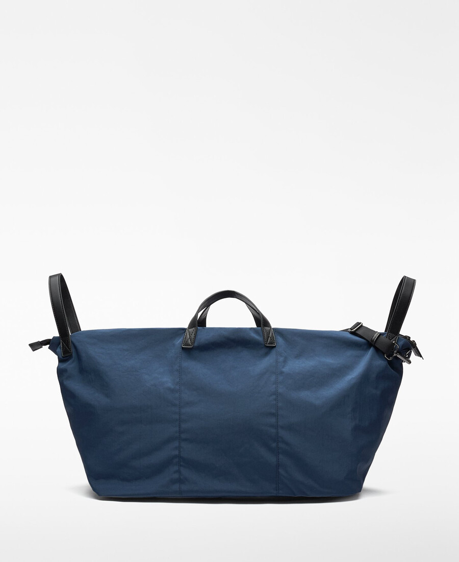homme de sac de voyage