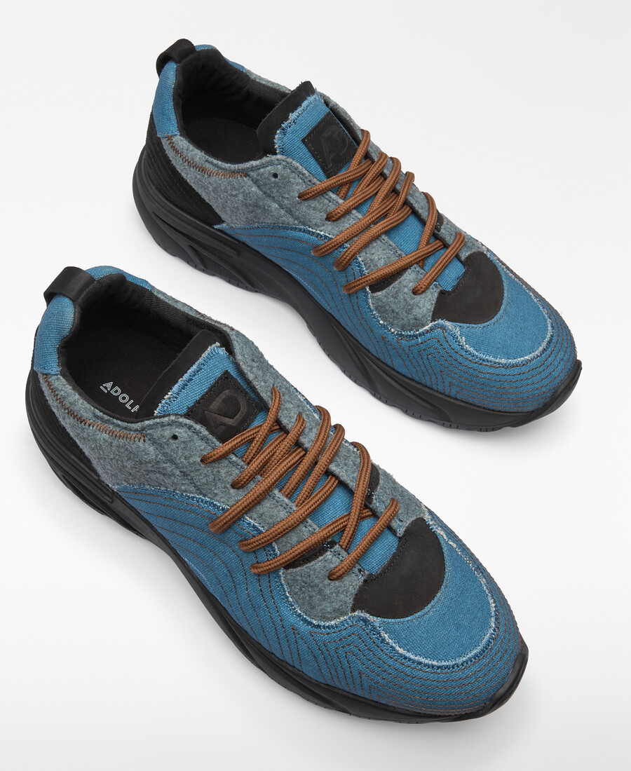 homme à baskets patchwork